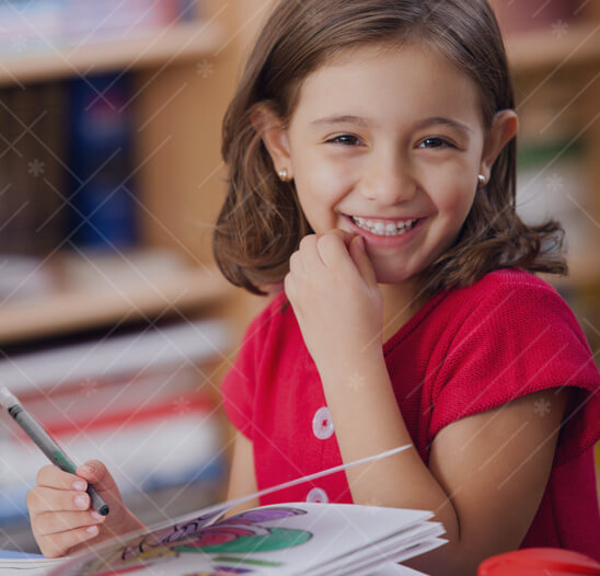 elementary school girl in coding class